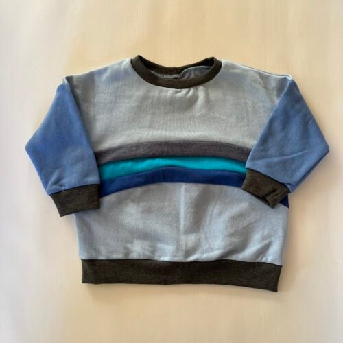 18-24 Rainbow Sweater light Blue and denim Blue sleeves